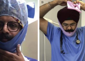 Image source: Elastic rubber band beard cover worn over turban and head cloth. "Under-mask beard cover (Singh Thattha technique) for donning respirator masks in COVID-19 patient care" 2020.